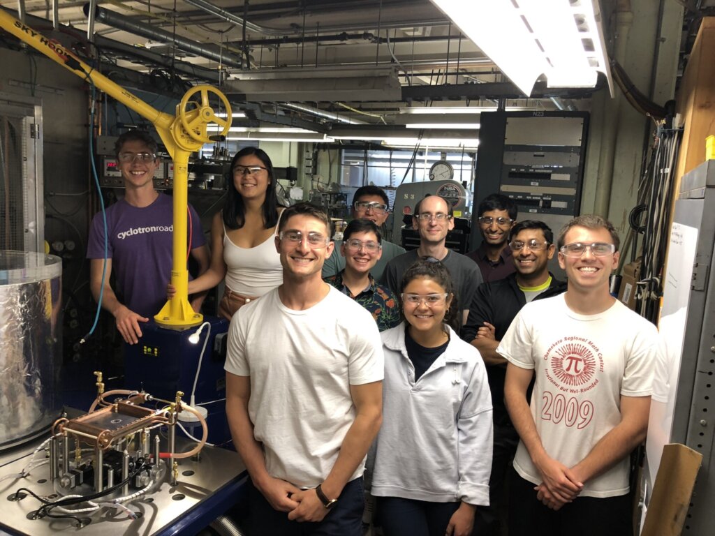A photo of the early Antora team in a lab.